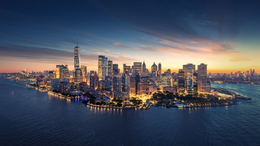New York City panorama skyline at sunrise. Manhattan office buil