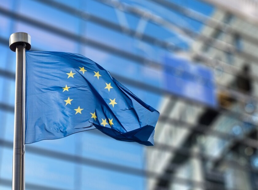 European Union flag against European Parliament