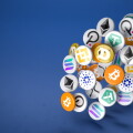 Logos of the main cryptocurrencies Bitcoin, Ethereum, Binance, Cardano, Ripple, Dogecoin, Tether, Solana, Polkadot falling onto a table. Copy space. 