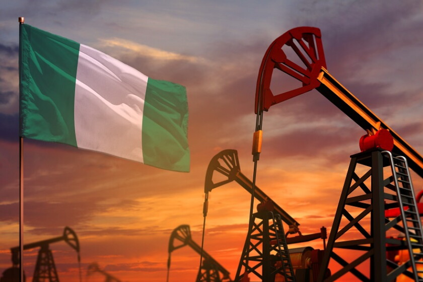 Nigeria oil industry concept. Industrial illustration - Nigeria flag and oil wells with the red and blue sunset or sunrise sky background - 3D illustration