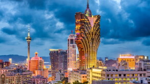Macau, China city skyline at dusk.