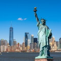 The Statue of Liberty over the Scene of New york cityscape river