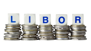 Stacks of coins with the letters LIBOR isolated on white
