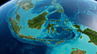 A satellite view of the Indonesian archipelago from space showing islands and ocean
