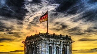 German building with dramatic skyline