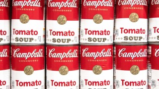 Los Angeles, CA/USA 6-21-2021 Can tins of Campbell's brand tomato soup full frame in a row