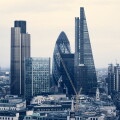 City of London business aria view at sunset. View includes Gherkin and modern skyscrapers of leading financial companies
