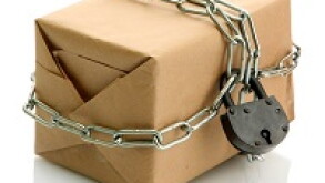 parcel with chain and padlock, isolated on white