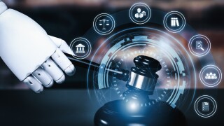 AI related law concept shown by savvy robot hand using lawyer working tools